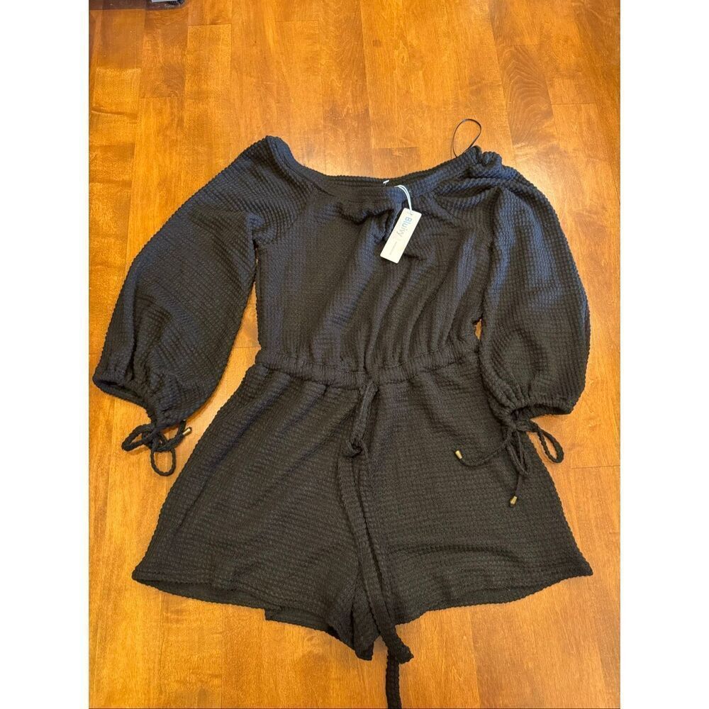 Woman’s new with tags boutique Blu Ivy long sleeve romper size medium